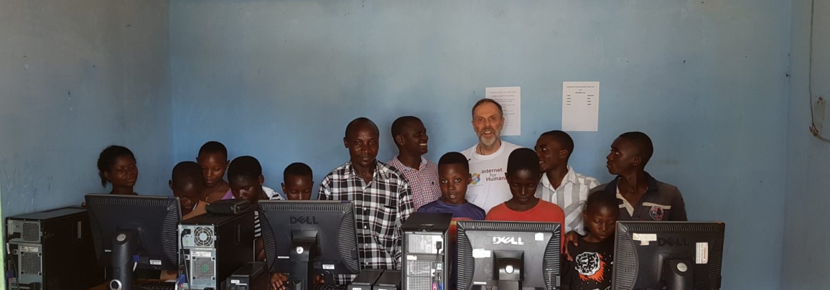 Robert Porter and students in an Internet for Humanity equipped classroom in Uganda