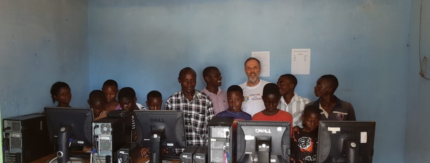 Robert Porter and students in an Internet for Humanity equipped classroom in Uganda