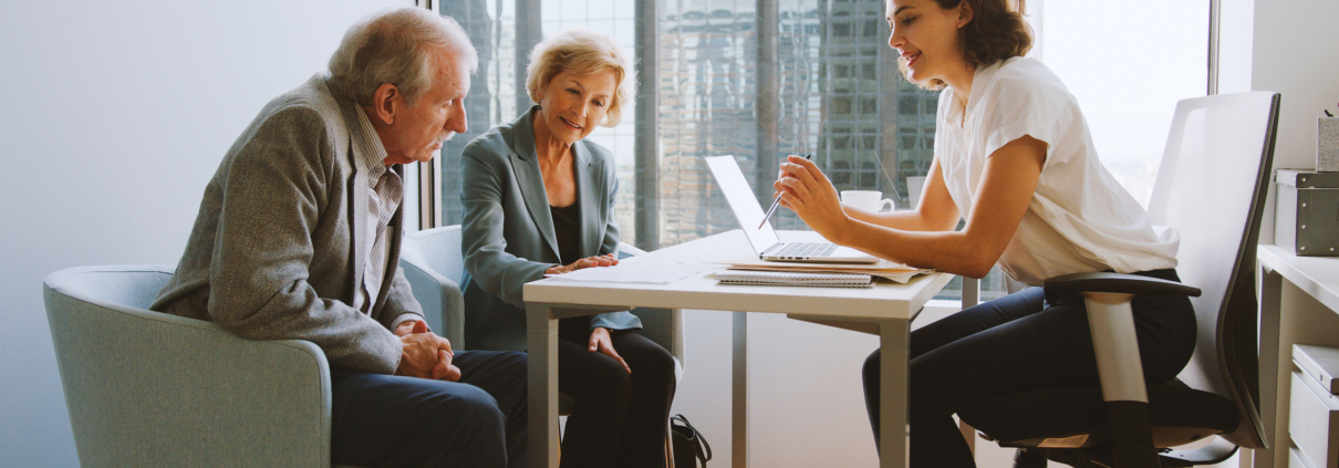 A financial advisor speaking to her clients, illustrating Canada Gives CEO Denise Castonguay explores the benefits of DAFs on The Sunday Money Show
