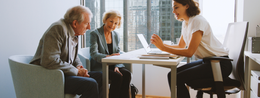 A financial advisor speaking to her clients, illustrating Canada Gives CEO Denise Castonguay explores the benefits of DAFs on The Sunday Money Show